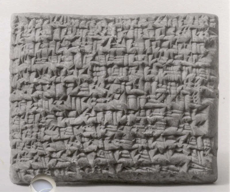Public-domain museum photograph of the Babylonian cuneiform house rental contract, accession 86.11.153